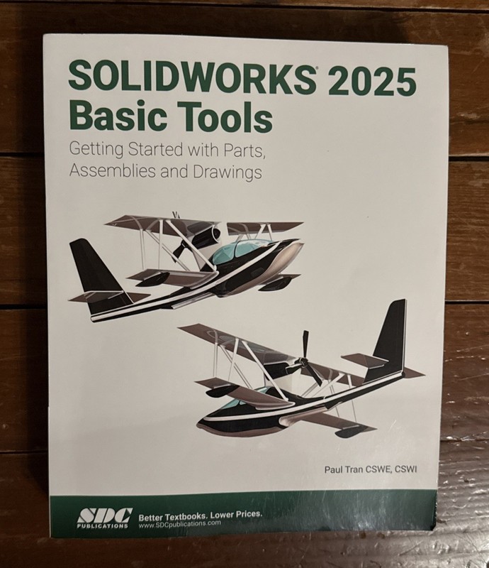 SOLIDWORKS 2025 Basic Tools: Getting Started – Paperback, by Paul Tran- Like New